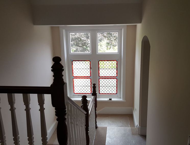 Refurbished landing-bay area, with a new stained glass sash window